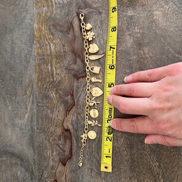 Gold tone charm adjustable charm bracelet- feather, lock, heart, star, moon - Picture 9 of 9